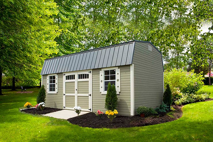 Mini Barn shed with amestown Red color Dutchlap siding, pequea tan color Trim and doors, Shiny Black color Roof